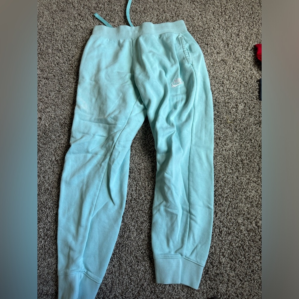 women’s blue/cyan nike sweats